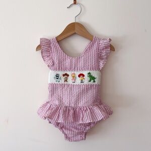HAND SMOCKED VGUC Toy Story Characters Seersucker One Piece Ruffle Swimsuit
